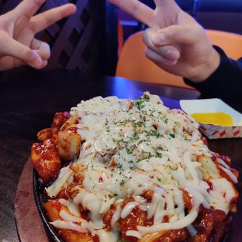 Luv Dduk - Spicy Chicken with Cheese -- excellent dish! Probably my favorite item! - Korean Near Me - Cerritos, California Luv Dduk - Spicy Chicken with Cheese -- excellent dish! Probably my favorite item! - Korean Near Me - Cerritos, California