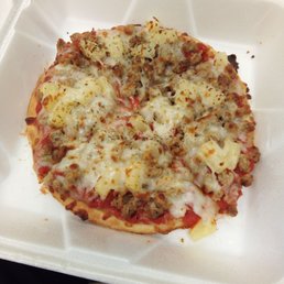 a pizza in a styrofoam container a pizza in a styrofoam container