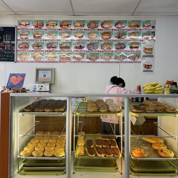 Best Donuts - a woman in a bakery - Donuts Near Me - San Ramon, California