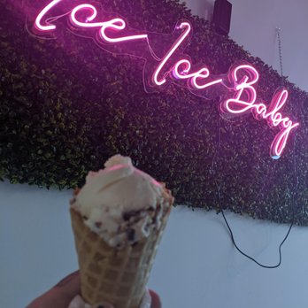 Bajo Zero - a hand holding a cone of ice cream - Ice Cream & Frozen Yogurt Near Me - Hutto, Texas