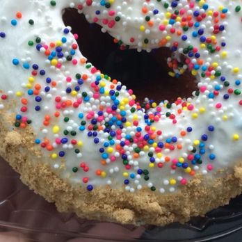 PVDonuts - Nice big fluffy donut with graham cracker crumbs along the outside and white frosting with sprinkles around the inside. Like a Dunkaroo! - Donuts Near Me - Providence, Rhode Island