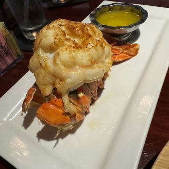 Polo Steak and Sea - Lobster tail with drawn butter. - Steakhouses Near Me - Vero Beach, Florida Polo Steak and Sea - Lobster tail with drawn butter. - Steakhouses Near Me - Vero Beach, Florida