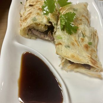 Shanghai Dumpling House - Slice beef rolled pancakes - light and flaky - Chinese Near Me - Tampa, Florida Shanghai Dumpling House - Slice beef rolled pancakes - light and flaky - Chinese Near Me - Tampa, Florida