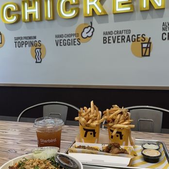Starbird Chicken - thai chicken salad, iced peach tea, and thai chicken tender... - Chicken Shop Near Me - Pleasanton, California Starbird Chicken - thai chicken salad, iced peach tea, and thai chicken tender... - Chicken Shop Near Me - Pleasanton, California