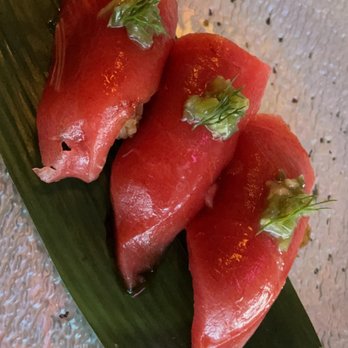 Umami Noodle Bar - three pieces of tuna on a leaf - Japanese Near Me - Calgary, Alberta Umami Noodle Bar - three pieces of tuna on a leaf - Japanese Near Me - Calgary, Alberta