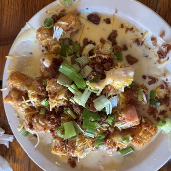 Trainwreck Saloon - Loaded tater tots! - Sports Bars Near Me - Saint Louis, Missouri