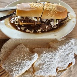 Roast Beef Po'Boy on top and Beignets on the bottom