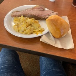 NY strip from the carving station w cheesy potatoes & roll