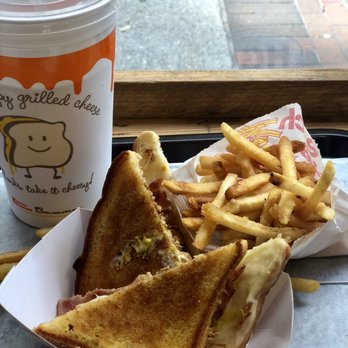 The Happy Grilled Cheese - Cordon Bleu with a side of garlic Parmesan fries and sweet tea - Food Trucks Near Me - Jacksonville, Florida