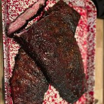 That Good Smoke - two pieces of meat on a red and white plate - Barbeque Near Me That Good Smoke - two pieces of meat on a red and white plate - Barbeque Near Me