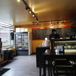 Emilio Finatti Pizzeria - Langley - First time here. Sitting at a table looking at menu.