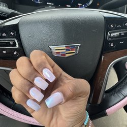 Vk Nails Bar & Spa - Could've been neater & shaped a little better but overall it looks really nice .