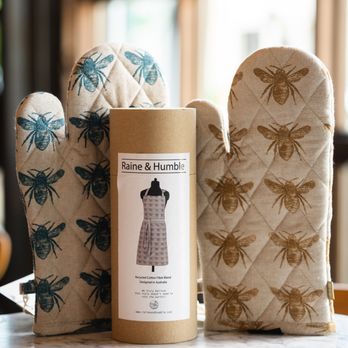 Metamora General Store - Add buzz to your kitchen with bee motif oven mitts and apron -- charming, practical, and perfect for everyday cooking. - Coffee & Tea Near Me - Metamora, Michigan