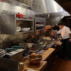Rutherford Grill - Kitchen with roaster being tended.