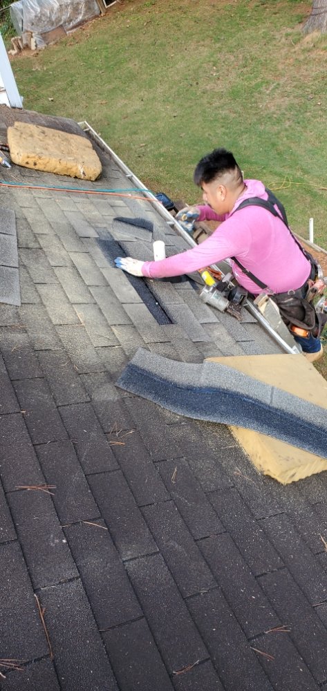 Slide of Frank Roofing