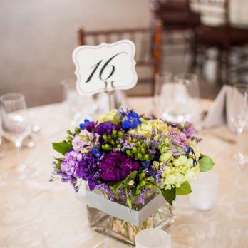 Jupiter Blooms - Low table centerpieces. Look at these amazing colors! - Florists Near Me