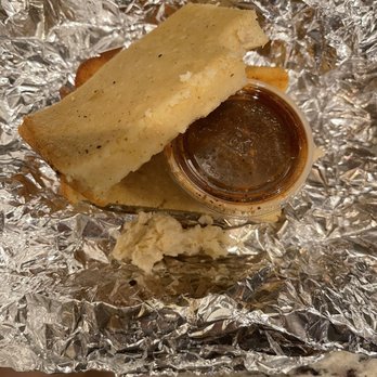 Sam Jones BBQ - Not cornbread in any way, I have no idea what is was... other than disgusting... - Barbeque Near Me - Raleigh, North Carolina