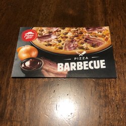 Pizza Hut - This location provides a coupon book post purchase