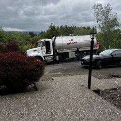 Lil Stinky Environmental Service - Septic pumping and inspection in progress
