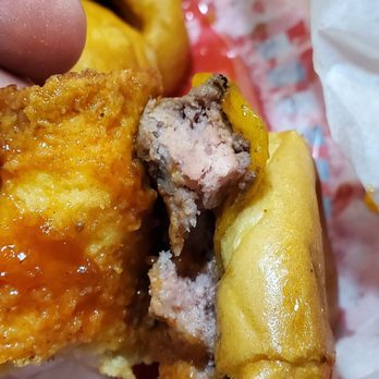 Foster's Grille - Raw burger..  one side cooked..  other raw..   they probaly use frozen patties. - Burgers Near Me - Marshall, Virginia