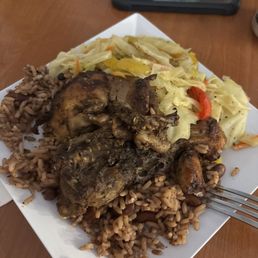 Jerk Chicken (Small) with cabbage and rice & beans. Jerk Chicken (Small) with cabbage and rice & beans.