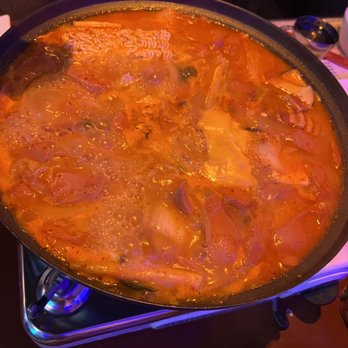 Ok Pocha - a large pan of food on a table - Korean Near Me - Dallas, Texas Ok Pocha - a large pan of food on a table - Korean Near Me - Dallas, Texas
