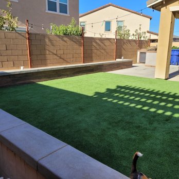 California Custom Landscape - I love our planter and the way it looks against the grass. Henry suggested a great artificial turf for our yard. - Landscaping Near Me - Chino, California