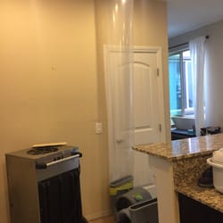 Water Damage Las Vegas - Kitchen area - flood from second floor down to kitchen walls.