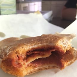 a half eaten pizza a half eaten pizza