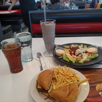 Steak ’n Shake - Classic American double cheese burger, taco salad, unsweetened ice tea, ice water, and dark chocolate shake. Satisfying! - Burgers Near Me - Ypsilanti, Michigan Steak ’n Shake - Classic American double cheese burger, taco salad, unsweetened ice tea, ice water, and dark chocolate shake. Satisfying! - Burgers Near Me - Ypsilanti, Michigan