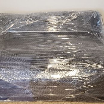 Alpha Moving - Leather couch completely covered - Movers Near Me Alpha Moving - Leather couch completely covered - Movers Near Me