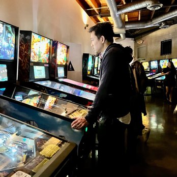 EightyTwo - Some cute boy playing arcade - Bars Near Me - Los Angeles, California