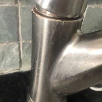 Sand 'N Sea Properties - Dirty sink faucet - Property Management Near Me - Galveston, Texas