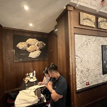 L'Avant Comptoir - One little booth in the back - Tapas Bars Near Me - Paris, 75