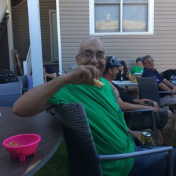 Bear enjoying blues blues in the patio