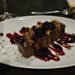 Chocolate with blueberry coulis