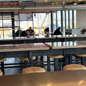 Chipotle Mexican Grill - people sitting at the counter - Mexican Near Me - Baltimore, Maryland