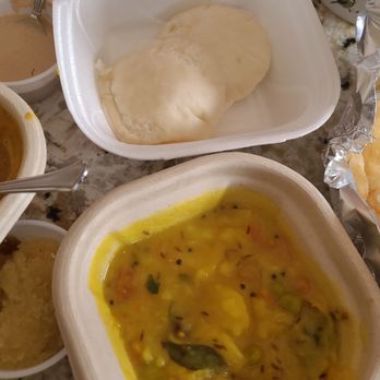 Grocerind & Inis Kitchen - Sat morning breakfast from Inis - potato sabzi, puri, idli, sambar, peanut chutney, sooji ka halwa - International Grocery Near Me - Fuquay-Varina, North Carolina
