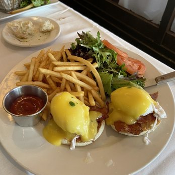 Ma Maison - Eggs Benedict, fries, and side of greens - French Near Me - Boston, Massachusetts