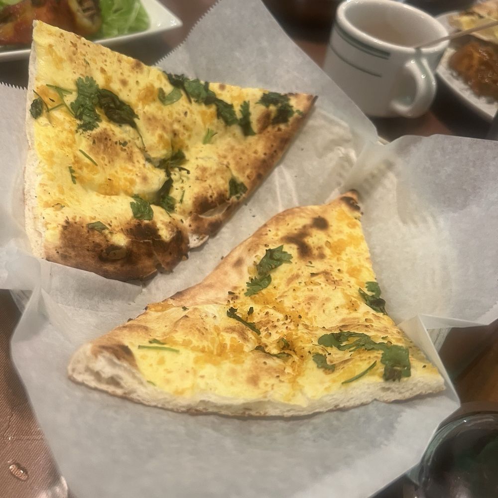 Guru Curry House - The comforting naan bread was all gone by the end of the meal. - Indian Near Me - El Cerrito, California