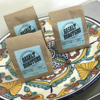 Basalt Roasters - three bags of roast roasters on a plate - Coffee Roasteries Near Me - Naches, Washington