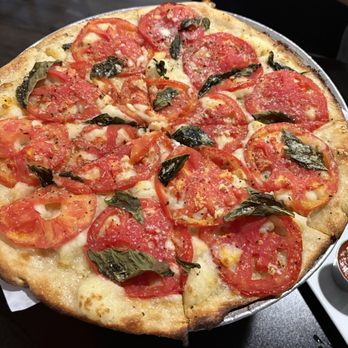 Tipsy Tomato Bar and Pizzeria - Margherita pizza with basil, garlic, EVOO, and mashed potatoes. Seasoning was perfect, and the pizza was delicious. - Pizza Near Me - Derby, Connecticut Tipsy Tomato Bar and Pizzeria - Margherita pizza with basil, garlic, EVOO, and mashed potatoes. Seasoning was perfect, and the pizza was delicious. - Pizza Near Me - Derby, Connecticut