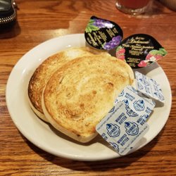 Cracker Barrel Old Country Store - This is what they substituted for cornbread and biscuits.  Not even a full size piece of bread!!