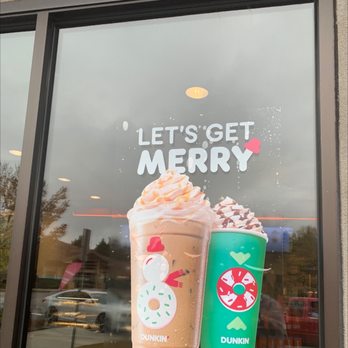 Dunkin' - a cup of coffee and a drink in front of a window - Coffee & Tea Near Me - Columbia, South Carolina Dunkin' - a cup of coffee and a drink in front of a window - Coffee & Tea Near Me - Columbia, South Carolina