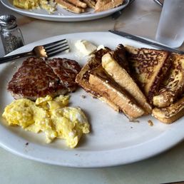 French Toast breakfast with scrambled egg and sausage.
