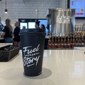 Black Rock Coffee Bar - Hazelnut latte with oat milk (12 oz) - Coffee & Tea Near Me - Hutto, Texas