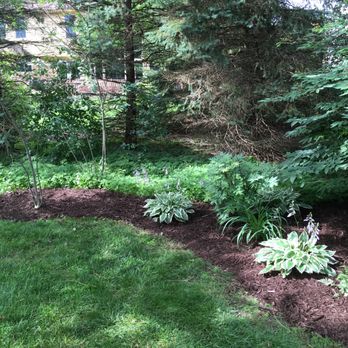 Rob's Mowing and Landscaping - A clean edge with dark mulch adds beauty to your yard - Landscaping Near Me Rob's Mowing and Landscaping - A clean edge with dark mulch adds beauty to your yard - Landscaping Near Me