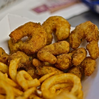 Fleck's Curbside Grill - fried onion rings and fries - Food Trucks Near Me