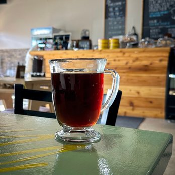 Detroit Sip - a cup of coffee on a table - Coffee & Tea Near Me - Detroit, Michigan Detroit Sip - a cup of coffee on a table - Coffee & Tea Near Me - Detroit, Michigan