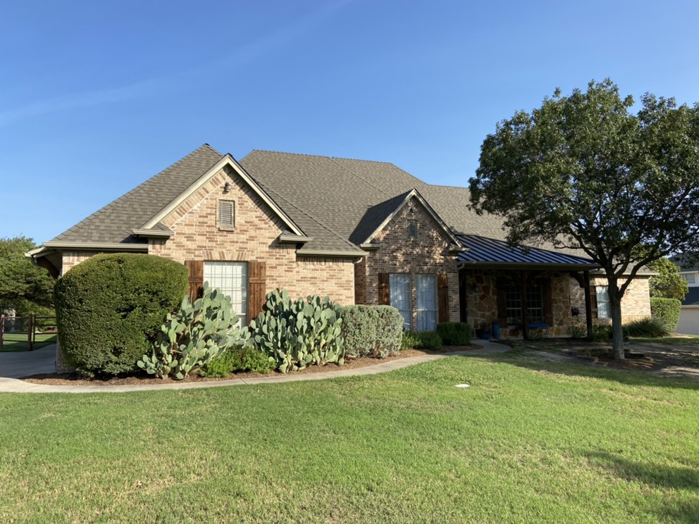 Slide of Taylor Roofing Solutions